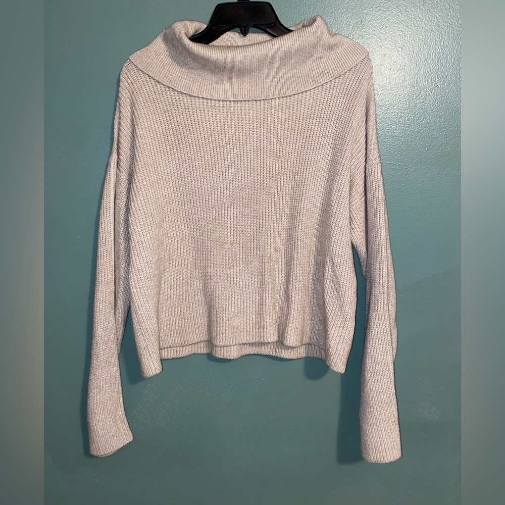 light brown sweater